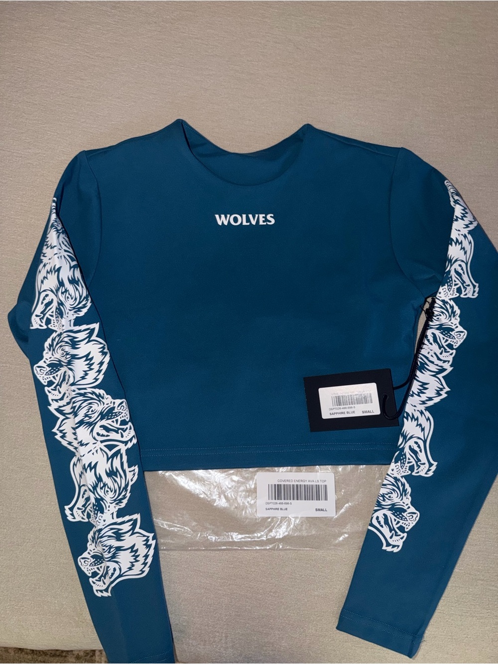 Darc Sport Teal Cropped Sweatshirt with White Wolf Sleeve Graphics